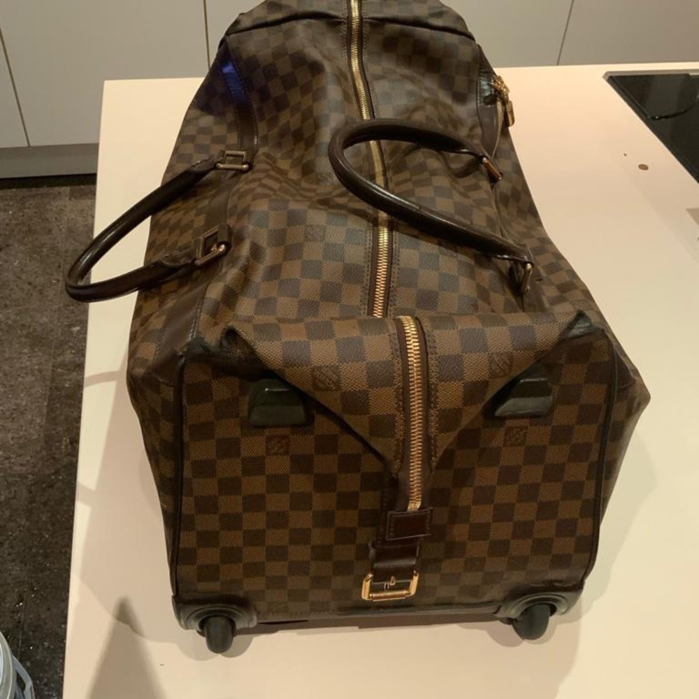 Louis Vuitton eole 60 duffel bag